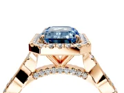 Halo Engagement Ring Setting for Fancy Blue Emerald Cut Center with Twist Band and Prong Head in Rose Gold