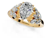 Leaf Cluster Engagement Ring Setting for Pear-Shaped Center with Marquise Accents and Prong Head in Yellow Gold