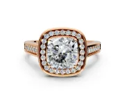 Halo Engagement Ring Setting for Cushion Cut Center with Outer Bezel Rim, Pave Band and Prong Head in Rose Gold