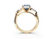 Channel-Set Engagement Ring Setting for Fancy Blue Asscher Cut Center with Baguette Band and Prong Head in Yellow Gold