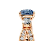 3 Stone Engagement Ring Setting for Fancy Blue Cushion Cut Center with Pave Twist Band and Prong Head in Rose Gold