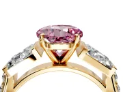 Channel-Set Engagement Ring Setting for Fancy Pink Round Cut Center with Baguette Band and Prong Head in Yellow Gold