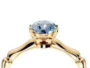 Solitaire Engagement Ring Setting for Fancy Blue Pear-Shaped Center with Bamboo Band and Prong Head in Yellow Gold