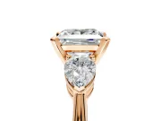 3 Stone Engagement Ring Setting for Princess Cut Center with Large Pear-Shaped Accents and Prong Head in Rose Gold