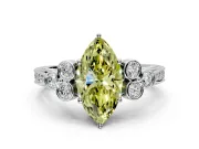 Cluster Engagement Ring Setting for Fancy Yellow Marquise Center with Bezel Accent Clusters and Prong Head in Sterling Silver