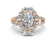 Large Accent Halo Engagement Ring Setting for Pear-Shaped Center with Pave Split Shank and Prong Head in Rose Gold
