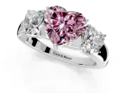 3 Stone Engagement Ring Setting for Fancy Pink Heart-Shaped Center with Raised Basket Heads and Prong Head in Platinum