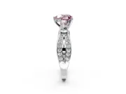 3 Stone Engagement Ring Setting for Fancy Pink Heart-Shaped Center with Pave Twist Band and Prong Head in Platinum