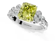 Cluster Engagement Ring Setting for Fancy Yellow Radiant Cut Center with Bezel Accent Clusters and Prong Head in Platinum