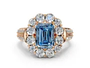 Large Accent Halo Engagement Ring Setting for Fancy Blue Emerald Cut Center with Pave Split Shank and Prong Head in Rose Gold