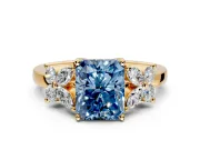 Floral Engagement Ring Setting for Fancy Blue Radiant Cut Center with Marquise Cluster Shoulders and Prong Head in Yellow Gold