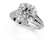 Solitaire Engagement Ring Setting for Round Cut Center with Accented Split Shank and Prong Head in Platinum