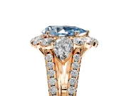 Halo Engagement Ring Setting for Fancy Blue Pear-Shaped Center with Two-Strand Split Shank and Prong Head in Rose Gold