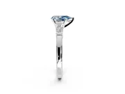 3 Stone Engagement Ring Setting for Fancy Blue Pear-Shaped Center with Channel Baguette Accents and Prong Head in Sterling Silver