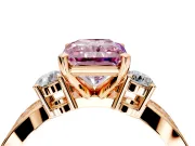 3 Stone Engagement Ring Setting for Fancy Pink Radiant Cut Center with Pave Twist Band and Prong Head in Rose Gold