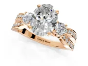 3 Stone Engagement Ring Setting for Oval Center with Pave Twist Band and Prong Head in Rose Gold