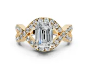 Halo Engagement Ring Setting for Emerald Cut Center with Pave Infinity Twist Band and Prong Head in Yellow Gold