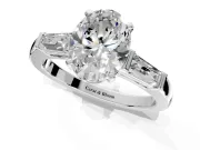 3 Stone Engagement Ring Setting for Oval Center with Tapered Baguettes, Plain Band and Prong Head in Platinum