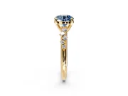Solitaire Engagement Ring Setting for Fancy Blue Round Cut Center with Trailing Leaf Accent Band and Prong Head in Yellow Gold