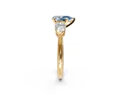 3 Stone Engagement Ring Setting for Fancy Blue Pear-Shaped Center with Large Pear-Shaped Accents and Prong Head in Yellow Gold