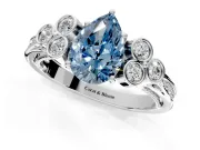 Cluster Engagement Ring Setting for Fancy Blue Pear-Shaped Center with Bezel Accent Clusters and Prong Head in Sterling Silver