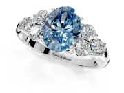 Cluster Engagement Ring Setting for Fancy Blue Oval Center with Round Cut Accent Frame and Prong Head in White Gold