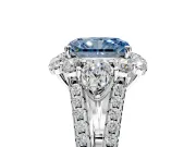 Halo Engagement Ring Setting for Fancy Blue Radiant Cut Center with Two-Strand Split Shank and Prong Head in Platinum