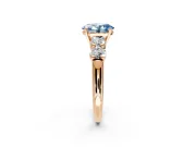 5 Stone Engagement Ring Setting for Fancy Blue Oval Center with Graduated Accents and Prong Head in Rose Gold
