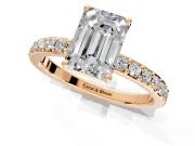 Solitaire Engagement Ring Setting for Emerald Cut Center with Round Cut Pave Band and Prong Head in Rose Gold
