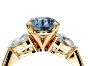 3 Stone Engagement Ring Setting for Fancy Blue Round Cut Center with Large Pear-Shaped Accents and Prong Head in Yellow Gold