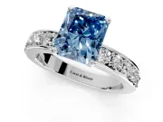 Solitaire Engagement Ring Setting for Fancy Blue Radiant Cut Center with Channel-Set Accents and Prong Head in Platinum