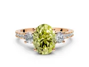 3 Stone Engagement Ring Setting for Fancy Yellow Oval Center with Round Cut Side Accents and Prong Head in Rose Gold