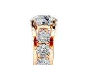 Solitaire Engagement Ring Setting for Round Cut Center with Graduated Shared Prongs and Prong Head in Rose Gold