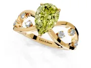 Solitaire Engagement Ring Setting for Fancy Yellow Pear-Shaped Center with Criss-Cross Accent Band and Prong Head in Yellow Gold