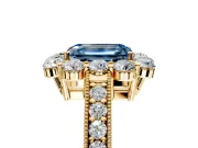 Halo Engagement Ring Setting for Fancy Blue Emerald Cut Center with Milgrain Channel Band and Prong Head in Yellow Gold