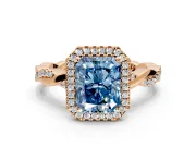 Halo Engagement Ring Setting for Fancy Blue Radiant Cut Center with Pave and Plain Twist Band and Prong Head in Rose Gold