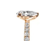 Solitaire Engagement Ring Setting for Pear-Shaped Center with Pave Band and Claw Prong Head in Rose Gold