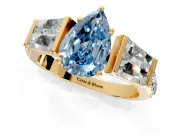 Channel-Set Engagement Ring Setting for Fancy Blue Pear-Shaped Center with Baguette Band and Prong Head in Yellow Gold