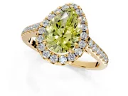 Halo Engagement Ring Setting for Fancy Yellow Pear-Shaped Center with Narrowing Pave Band and Prong Head in Yellow Gold
