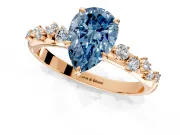 Cluster Engagement Ring Setting for Fancy Blue Pear-Shaped Center with Round Cut Accent Band and Prong Head in Rose Gold