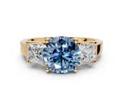 3 Stone Engagement Ring Setting for Fancy Blue Round Cut Center with Matching Side Accents and Prong Head in Yellow Gold