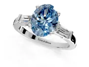 3 Stone Engagement Ring Setting for Fancy Blue Oval Center with Channel Baguette Accents and Prong Head in White Gold