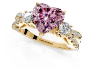 3 Stone Engagement Ring Setting for Fancy Pink Heart-Shaped Center with Pave Split Shank and Prong Head in Yellow Gold