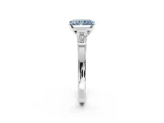 3 Stone Engagement Ring Setting for Fancy Blue Radiant Cut Center with Channel Baguette Accents and Prong Head in Platinum