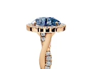 Halo Engagement Ring Setting for Fancy Blue Round Cut Center with Twist Band and Prong Head in Rose Gold
