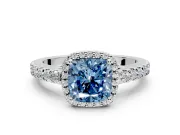 Halo Engagement Ring Setting for Fancy Blue Cushion Cut Center with Full Pave Band and Prong Head in White Gold