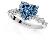 Solitaire Engagement Ring Setting for Fancy Blue Heart-Shaped Center with Trailing Leaf Accent Band and Prong Head in White Gold
