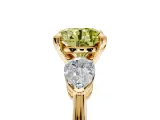 3 Stone Engagement Ring Setting for Fancy Yellow Round Cut Center with Large Pear-Shaped Accents and Prong Head in Yellow Gold
