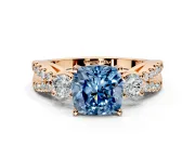 3 Stone Engagement Ring Setting for Fancy Blue Cushion Cut Center with Pave Split Shank and Prong Head in Rose Gold