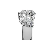 3 Stone Engagement Ring Setting for Heart-Shaped Center with Raised Basket Heads and Prong Head in White Gold
